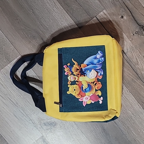 Disney Handbags - Winnie the Pooh Lunch Sak Tote Bag NEW